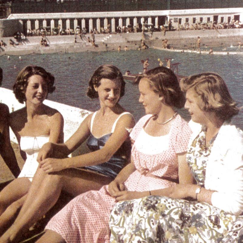 Young women pose for the camera on the top terrace