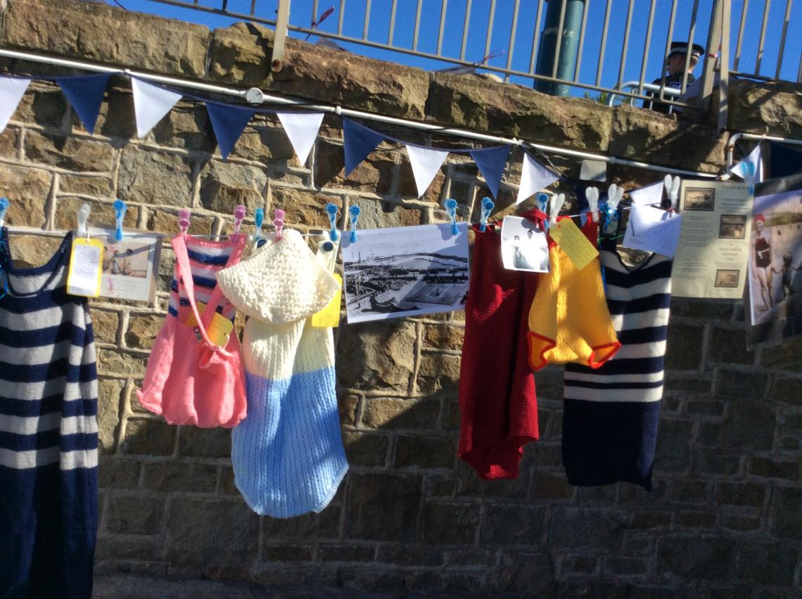 Bathing costumes on the line - exhibition