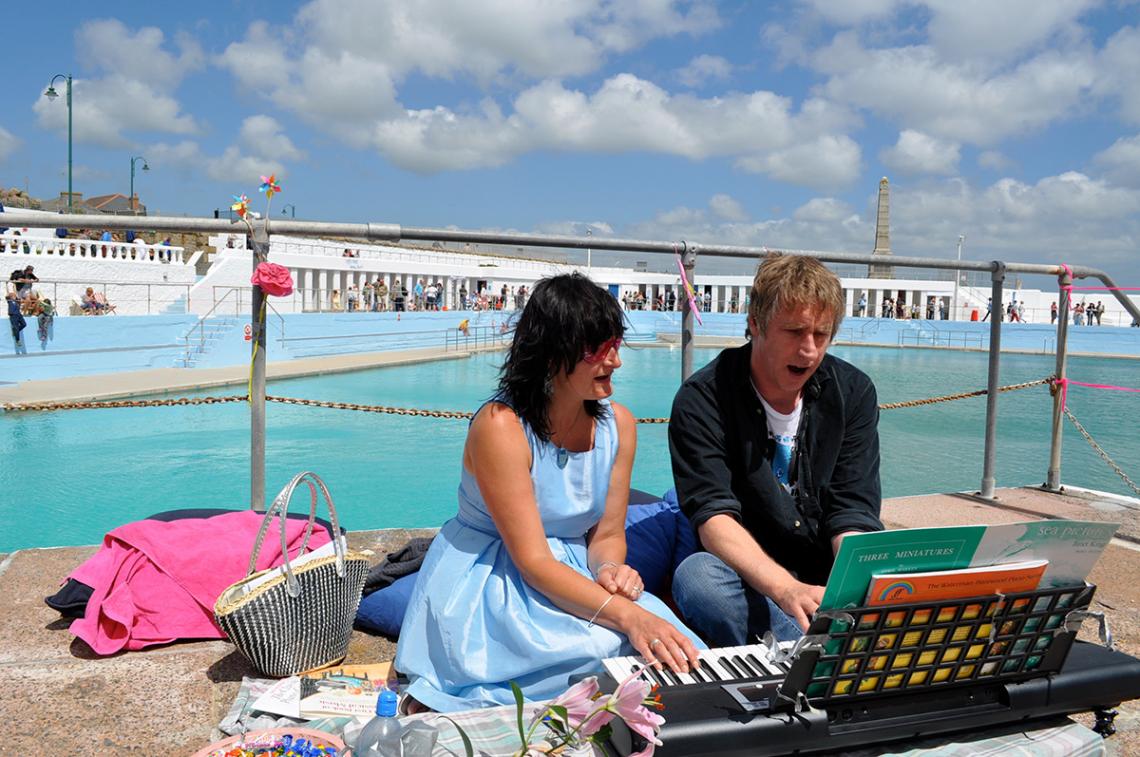 Two musicians at the Art75 event