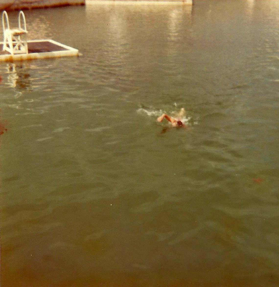 Swimmer and raft in Jubilee Pool