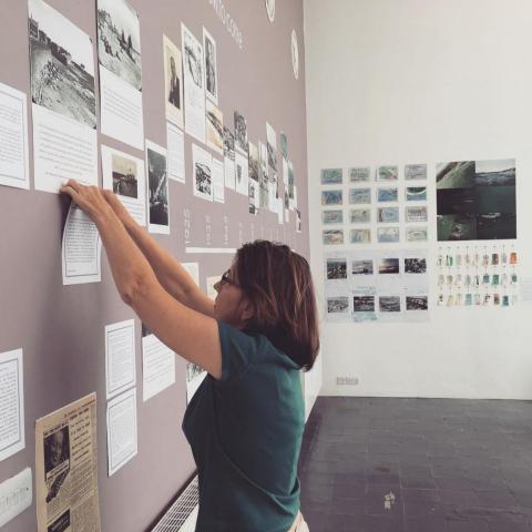 Pinning exhibition to wall