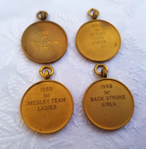Liz Jilbert reverse of gold county medals